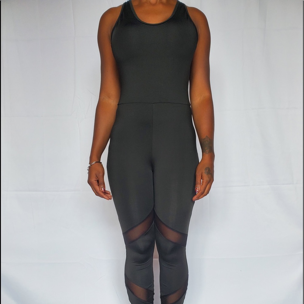 Spandex one piece w/ mesh cut outs @ leg